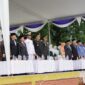 Wakil Bupati Batu Bara Syafrizal memimpin upacara Harkitnas ke-118 di Lapangan Tanjung Gading, Rabu (20/5/2026), bersama Forkopimda dan peserta upacara.