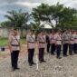 Kapolres Nagan Raya AKBP Dr. Benny Bathara memimpin upacara penghormatan dan tabur bunga di Taman Makam Pahlawan dalam rangka Hari Bhayangkara ke-80.